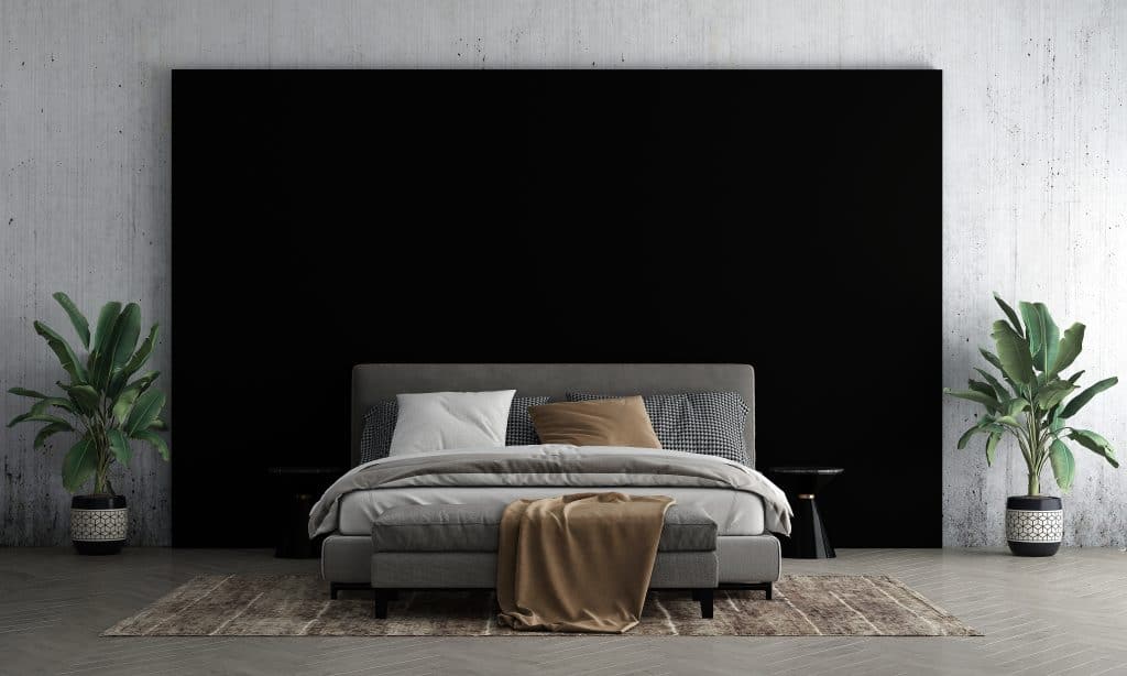 Un pan de mur noir : comment ne pas assombrir la chambre ?