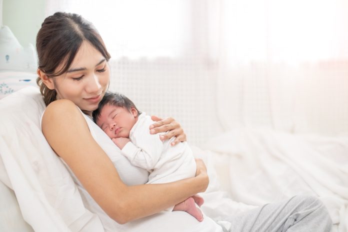 happy,loving,family.,mother,playing,with,her,baby,hugging,in